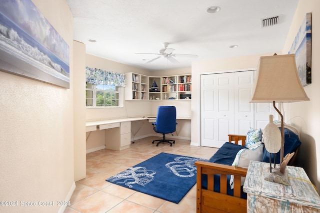 5280 95th St, Sebastian, FL 32958 - home office featuring built in study area, tile patterned flooring, ceiling fan, and recessed lighting