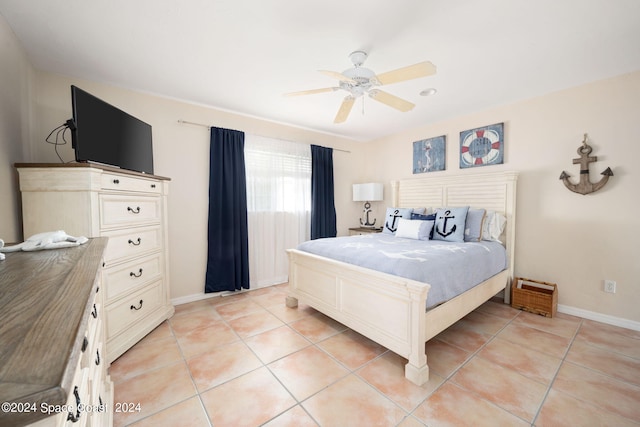 5280 95th St, Sebastian, FL 32958 - bedroom featuring light tile patterned flooring and ceiling fan