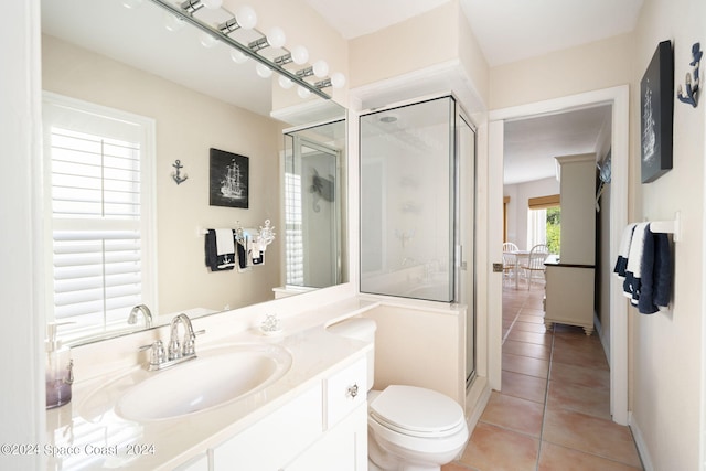 5280 95th St, Sebastian, FL 32958 - bathroom with tile patterned floors, a stall shower, and vanity