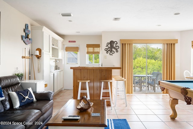 5280 95th St, Sebastian, FL 32958 - living room featuring light tile patterned floors, plenty of natural light, billiards, and recessed lighting