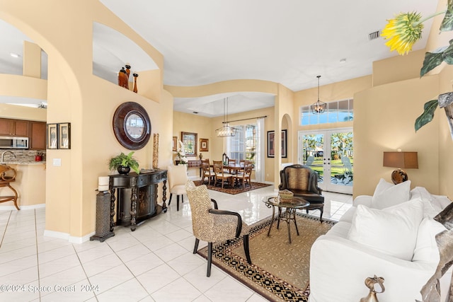 tiled living room with french doors