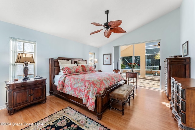 bedroom featuring light wood-type flooring, ceiling fan, and vaulted ceiling