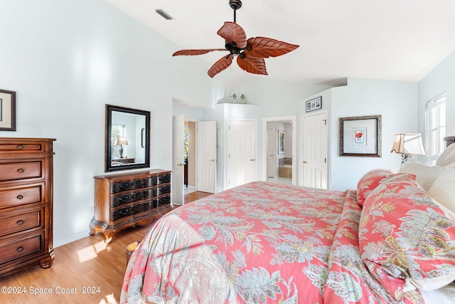 bedroom with lofted ceiling, ceiling fan, and light hardwood / wood-style flooring