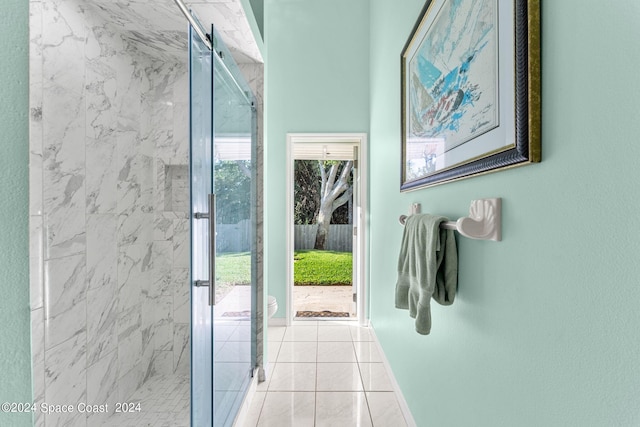 corridor featuring light tile patterned floors