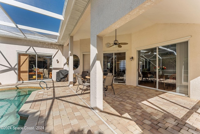 view of patio featuring ceiling fan