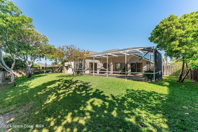 view of yard featuring a lanai