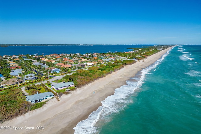 aerial view with a view of the beach and a water view