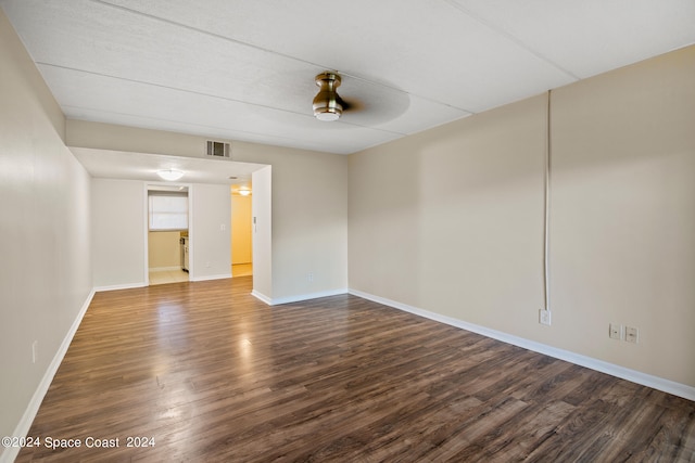 spare room with wood-type flooring and ceiling fan