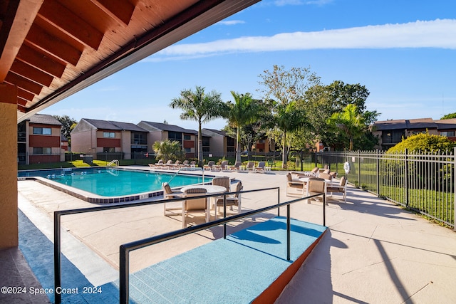 view of pool featuring a patio area