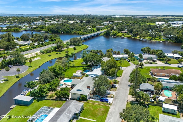 drone / aerial view featuring a water view