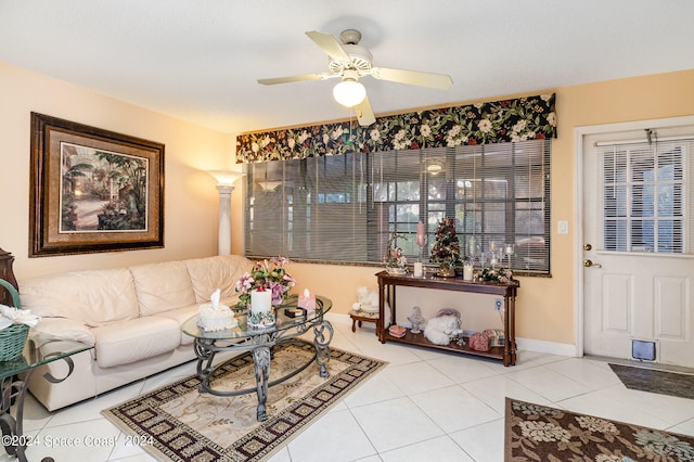 tiled living room featuring ceiling fan