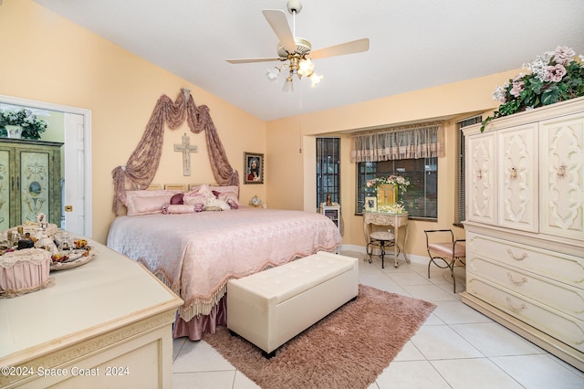 tiled bedroom with ceiling fan