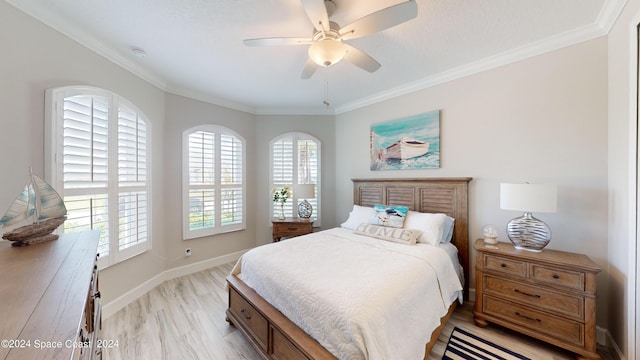 362 Tiki Ter, Daytona Beach, FL 32124 - bedroom with multiple windows, light wood-style flooring, baseboards, and ornamental molding