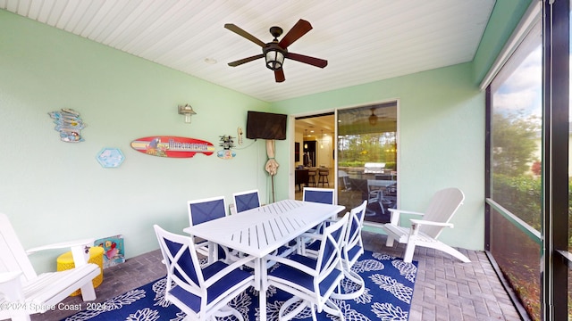 362 Tiki Ter, Daytona Beach, FL 32124 - sunroom / solarium featuring outdoor dining area and ceiling fan