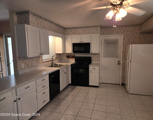 kitchen featuring black appliances, ceiling fan, sink, and white cabinets