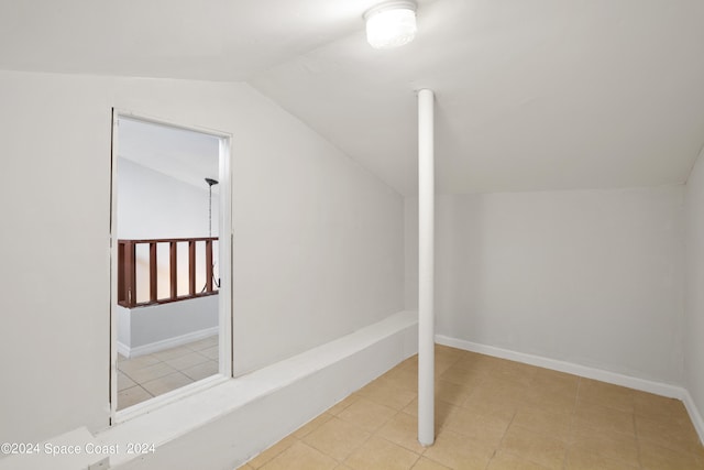 bonus room featuring vaulted ceiling