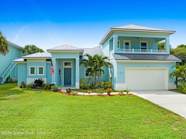 view of front facade featuring a front lawn and a garage