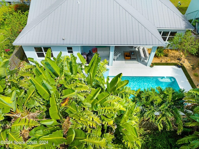 view of swimming pool featuring a patio