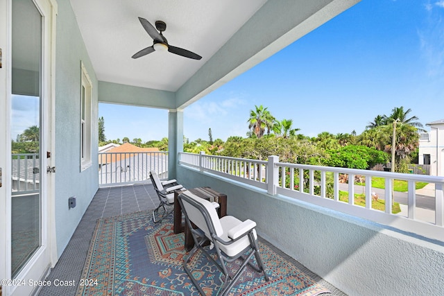 balcony featuring ceiling fan