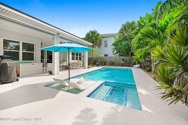 view of pool with a patio