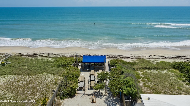 view of water feature with a beach view