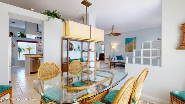 dining room with light tile patterned flooring and ceiling fan