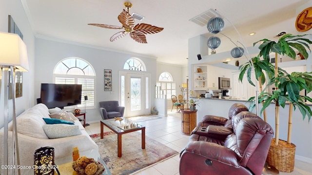 living room featuring crown molding, french doors, light tile patterned floors, and ceiling fan