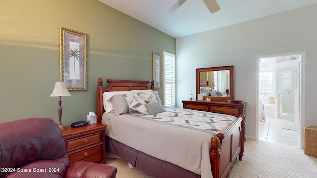 carpeted bedroom with lofted ceiling, ceiling fan, and connected bathroom