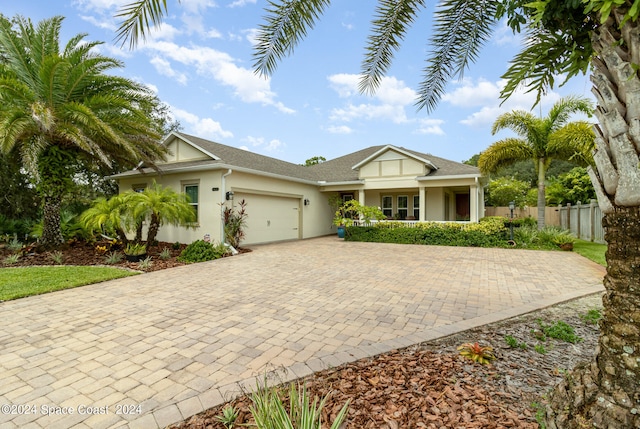 view of front of property with a garage