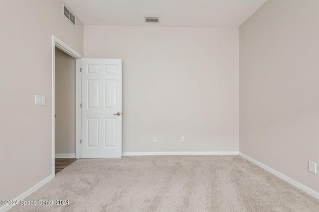 empty room with light carpet