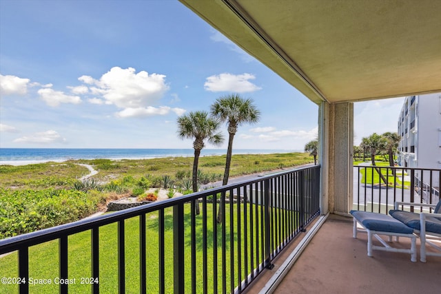 balcony featuring a water view