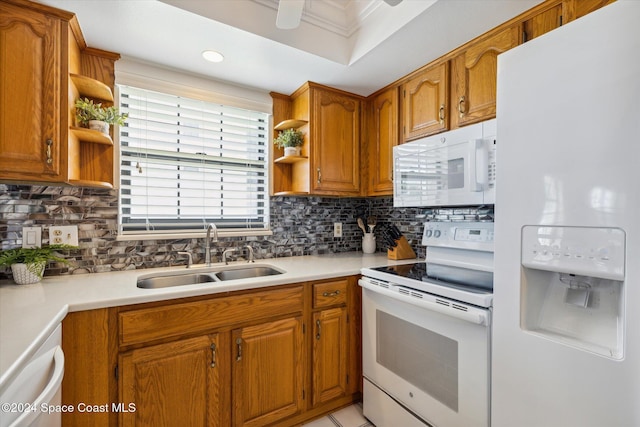 kitchen featuring light tile patterned flooring, white appliances, backsplash, and sink