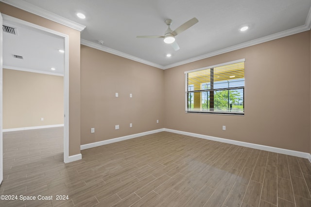 unfurnished room with light wood-type flooring, baseboards, and visible vents