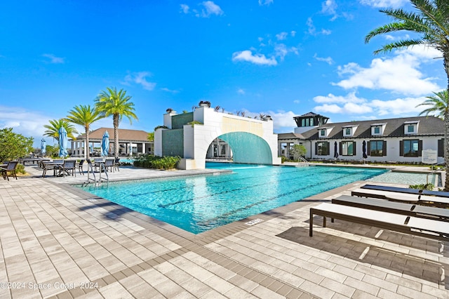 pool with a patio