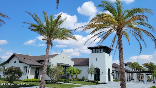 view of property with driveway