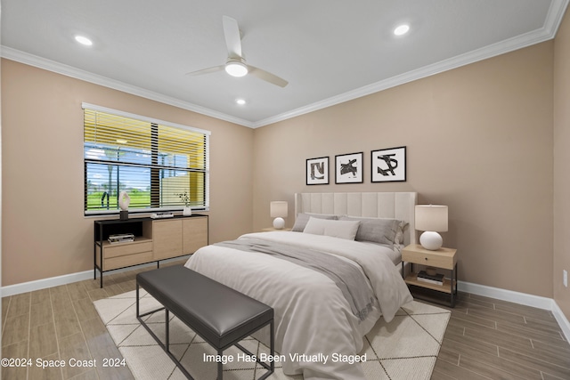 bedroom featuring light wood-type flooring, crown molding, and ceiling fan