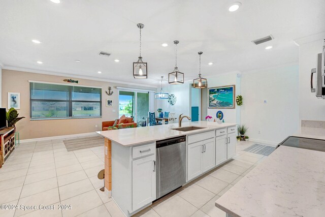 kitchen featuring a center island with sink, sink, hanging light fixtures, stainless steel dishwasher, and white cabinets