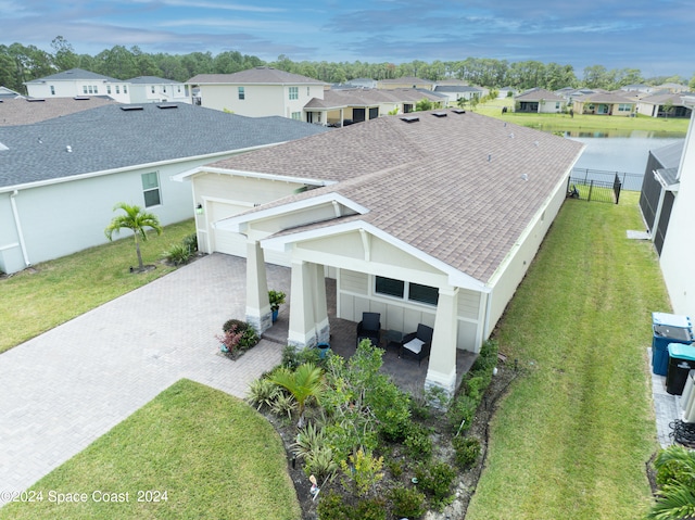 birds eye view of property with a residential view