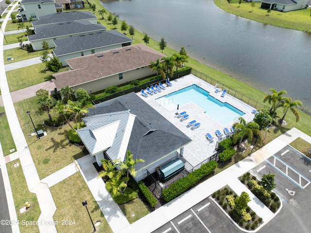 aerial view featuring a water view and a residential view