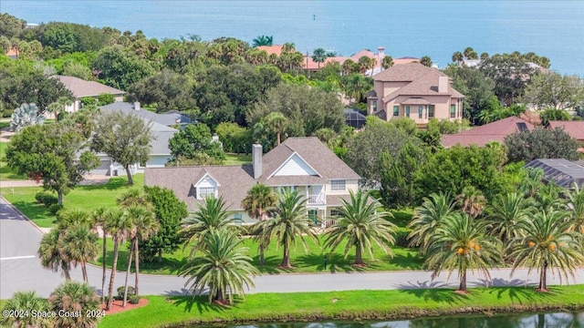 bird's eye view with a water view