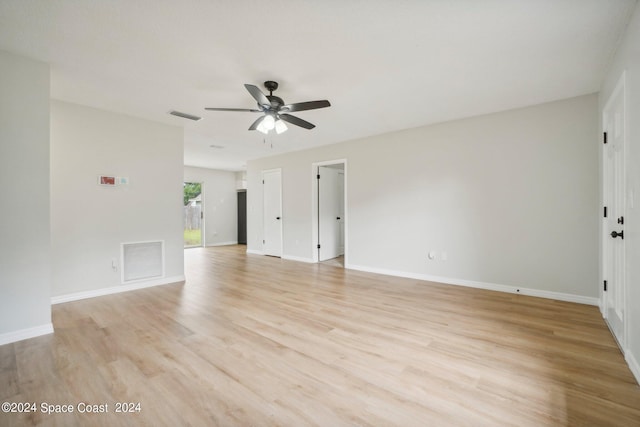 unfurnished living room with ceiling fan and light hardwood / wood-style floors