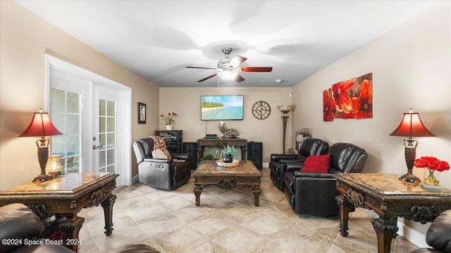 living room with ceiling fan and french doors