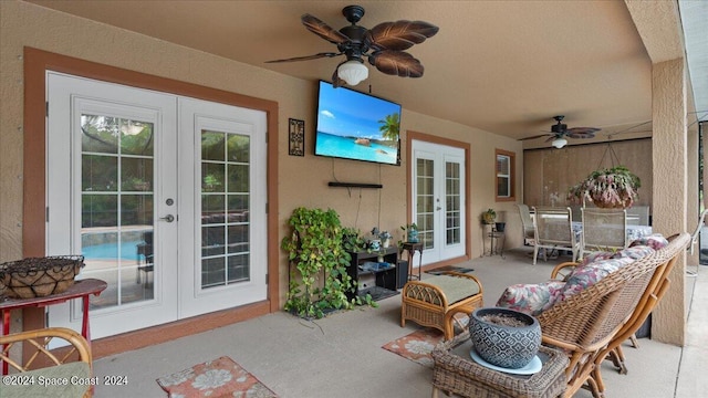 view of patio featuring ceiling fan and french doors