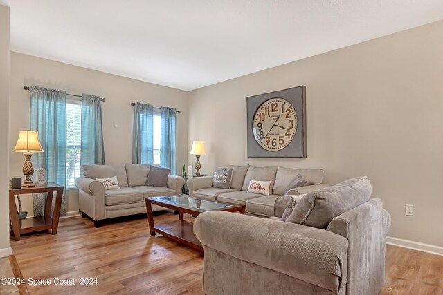 living room with light hardwood / wood-style floors