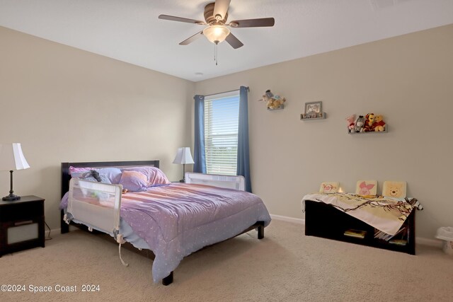 bedroom with light colored carpet and ceiling fan