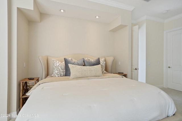 bedroom featuring carpet floors and ornamental molding