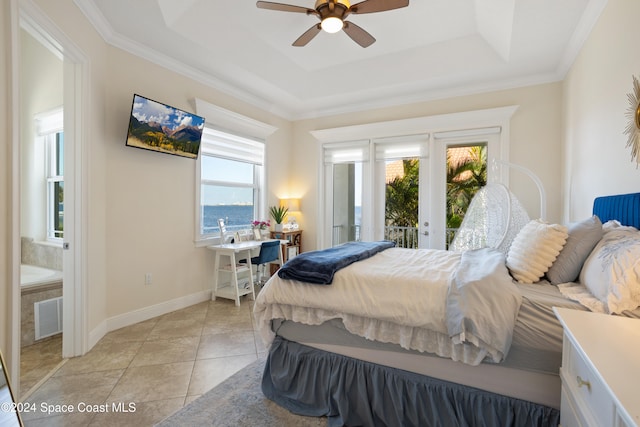 tiled bedroom featuring ceiling fan, ornamental molding, a raised ceiling, and access to outside