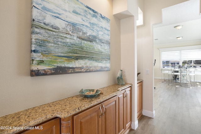 hallway featuring light hardwood / wood-style flooring