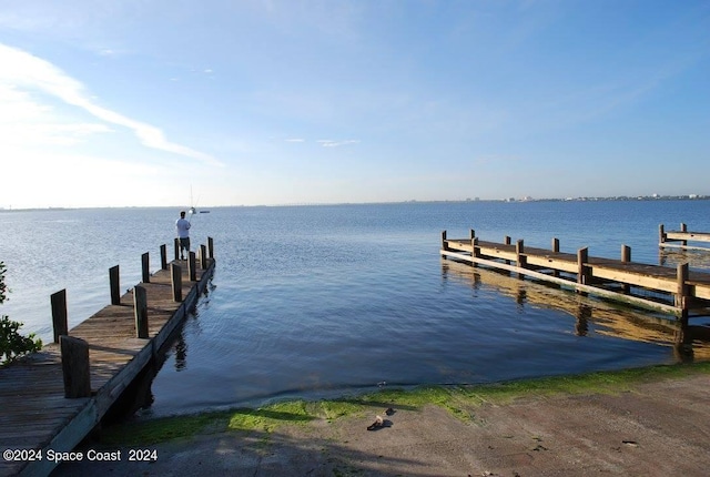 view of dock with a water view