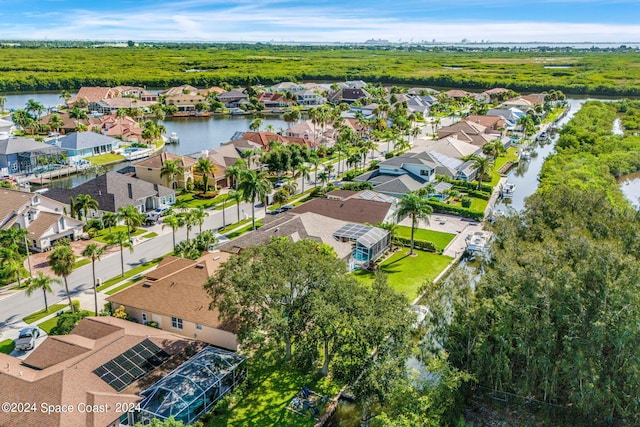 aerial view with a residential view and a water view